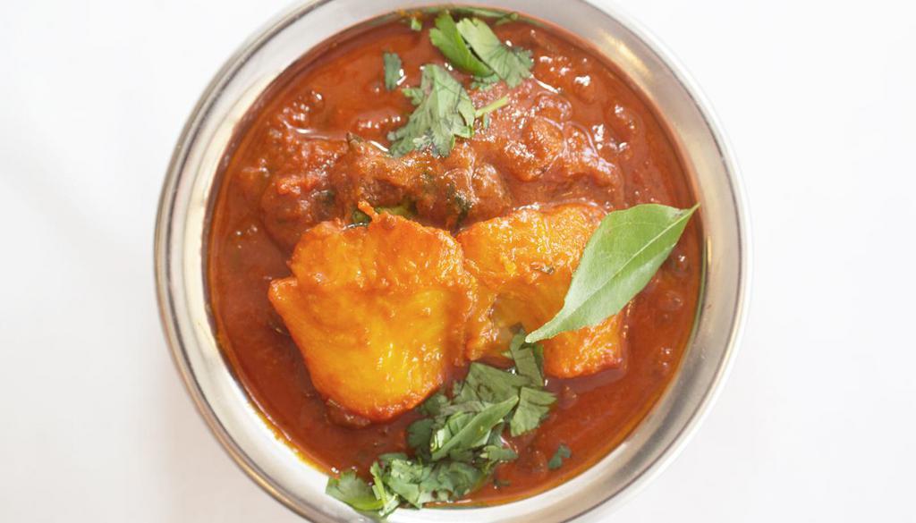 FISH CURRY* · Fresh fish cooked in Nellore style tamarind sauce and spices.