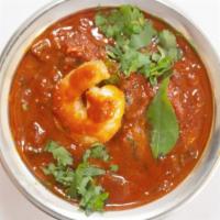 SHRIMP CURRY* · Shrimp cooked in onion, tomato, and Indian spices.
