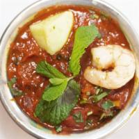 SHRIMP VINDALOO* · Spicy shrimp curry cooked in tomato sauce.