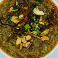 HALEEM(GOAT)* · Slow-cooked goat meat with flavors of spices, lentils, barley, and wheat.