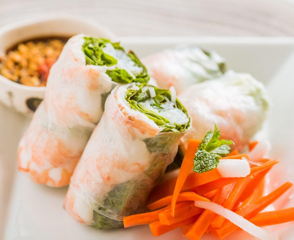 #6. Vietnamese Shrimp Rolls · Steamed prawns, lettuce, mint leaves and rice vermicelli wrapped in rice paper. Served with crushed peanuts and chili in hoisin caramelized dipping sauce.