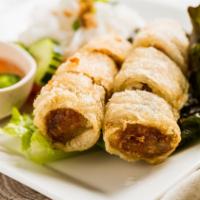 #5. Crispy Imperial Rolls · Pork meat, mushrooms, carrots and taro wrapped in rice paper, deep fried and served with fis...