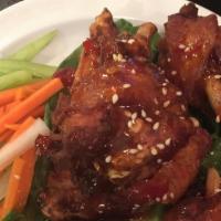 #8. Lemongrass Fried Chicken Wings · Deep fried chicken wings marinated in lemongrass sauce, served with sweet and spicy sauce an...