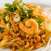 #56. Pad Thai · Spicy. Pan fried flat rice noodles, tamarind, garlic, shallot tofu, egg, bean sprouts, peanu...