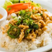 #74. Spicy Basil Chicken · Small pieces of white breast meat chicken stir fried with fresh basil leaves, served with sa...