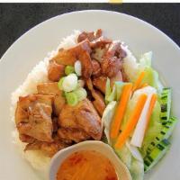 #64. Five Spice Chicken over Rice · Vietnamese style marinated pieces of boneless chicken served on a bed of rice.
