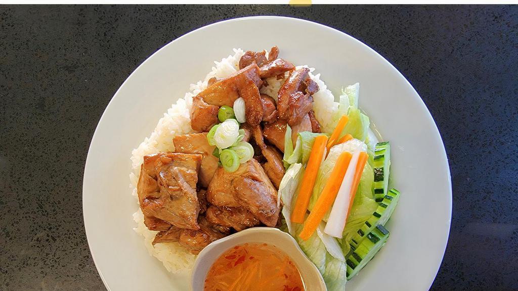 #64. Five Spice Chicken over Rice · Vietnamese style marinated pieces of boneless chicken served on a bed of rice.