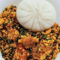 Egwusi soup with pounded yam · homemade melon seed soup with spinach, palm oil and spices. Served with or without stock fis...