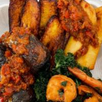Bole combo · fried yam, plantain, and fish  topped with bole red peppered sauce and served with kale-shri...