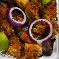 Port Harcourt Bole · roasted plantain, and roasted full fish marinated with Ethiopian spice, served with  peppere...