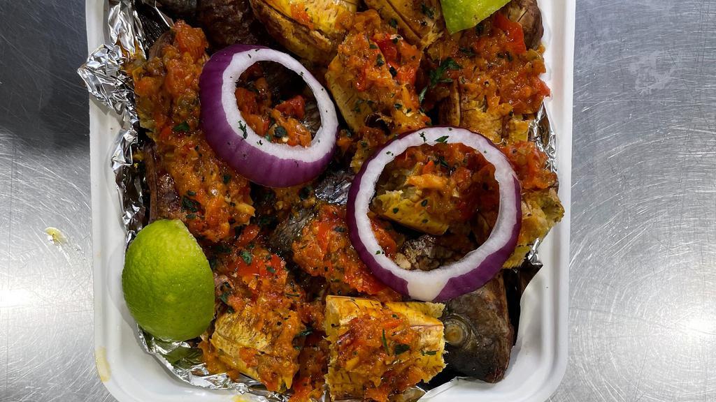 Port Harcourt Bole · roasted plantain, and roasted full fish marinated with Ethiopian spice, served with  peppered red stew
