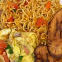 Indomie jollof · two packs of chicken indomie noodles mixed with carrots, green onion, red peppers, and onion...