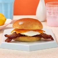 Loaded Bacon Breakfast Sandwich · Two fried eggs, bacon, tomato, and cheddar cheese on your choice of bread.