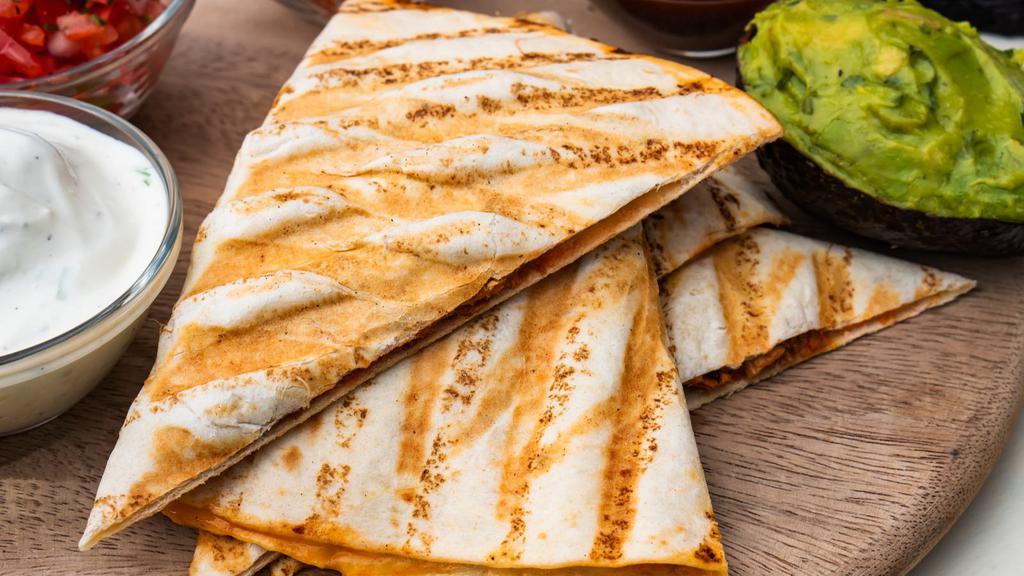 Flour Quesadilla · Delicious Flour quesadilla filled with cheese and salsa.