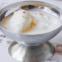Rasmalai · Rasmalai is a popular Indian sweet of cottage cheese balls soaked in thickened, sweetened an...