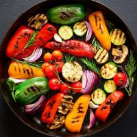 Grilled Vegetables Meal · A Delicious mix of Grilled vegetables served with rice, beans, salad and tortillas.