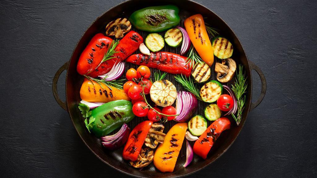 Grilled Vegetables Meal · A Delicious mix of Grilled vegetables served with rice, beans, salad and tortillas.