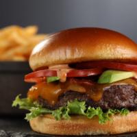 Blue Cheese Burger · Burger, cajun seasoning, blue cheese crumbles, lettuce tomato and house sauce.
