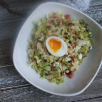 Cobb Salad · Mixed greens, applewood bacon, tomatoes, egg, avocado, crumbled blue cheese, honey lemon vin...