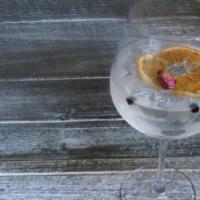 Rosebud Gin & Tonic · Nolets Gin, Elderflower Tonic, Juniper Berries, Rosebuds, Dried Orange Peel