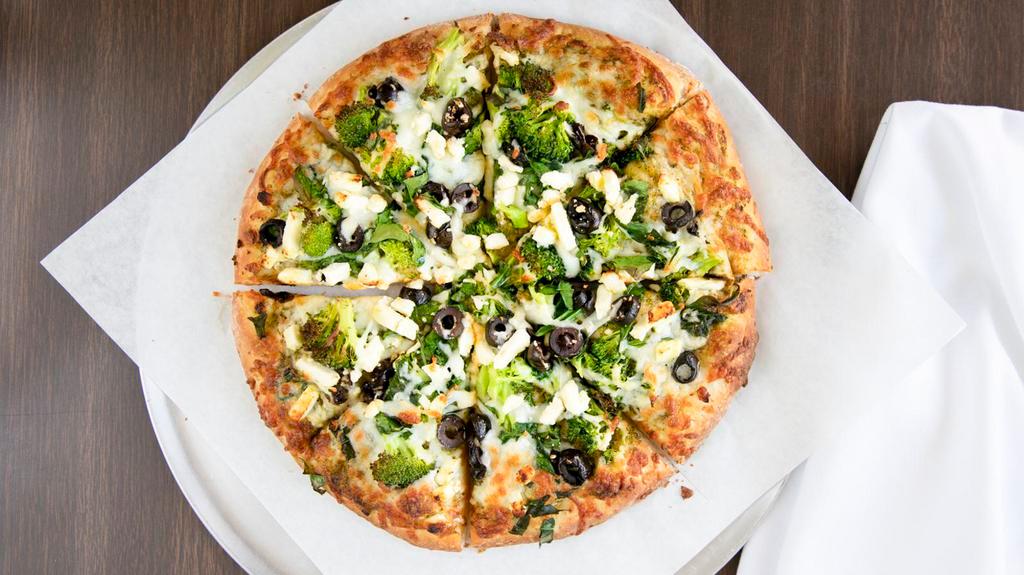 4. Greek Goddess Pizza · Instead of tomato sauce, we use pesto sauce, and top it off with spinach, broccoli, black olives, garlic, and feta cheese.