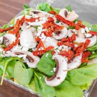 Spinach Salad · Spinach, mushrooms, sun-dried tomatoes and feta cheese. Serves 2 to 3 people.