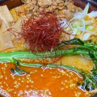 Tan Tan Men Ramen · Special spicy miso ramen.
spicy ground pork,bamboo shoots,Tokyo leek,broccolini