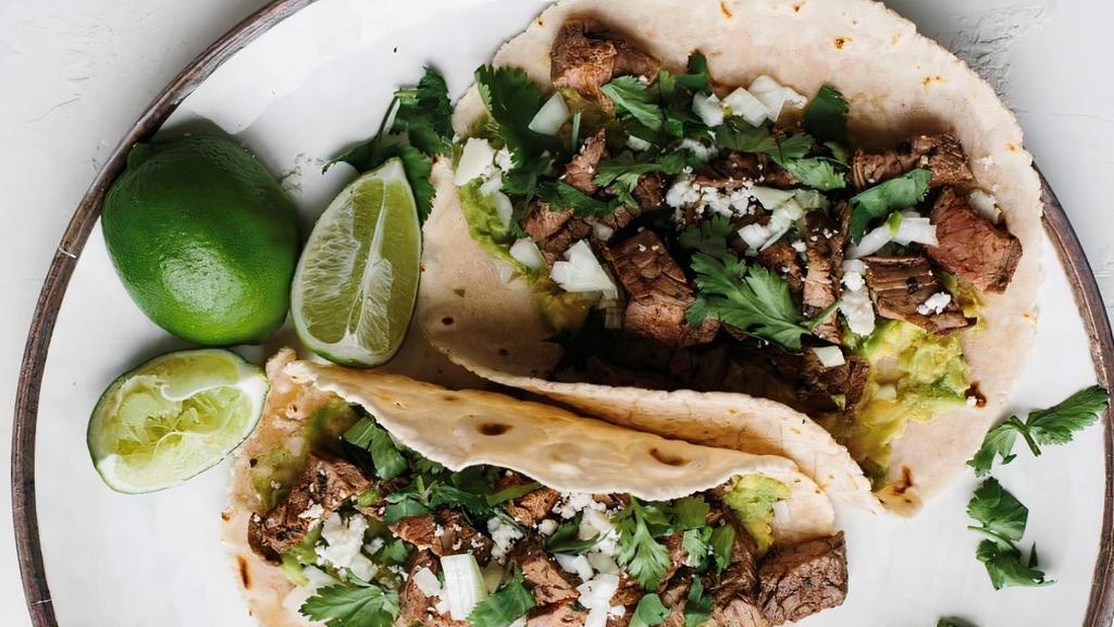 Street Tacos - 4 · Your favorite staple food. Choice of meat: al pastor or asada. Topped with cilantro, chopped onion and green salsa.