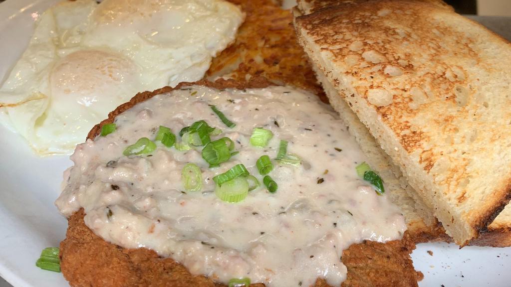 Country Fried Stk · CF Steak topped with homemade sausage gravy, 2 eggs any style, yukon gold hash browns and toast