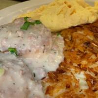 Biscuits & Gravy · 2 fresh baked biscuits topped with homemade sausage gravy, 2 eggs any style and yukon gold h...