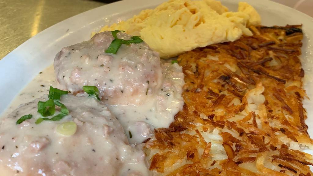 Biscuits & Gravy · 2 fresh baked biscuits topped with homemade sausage gravy, 2 eggs any style and yukon gold hash browns