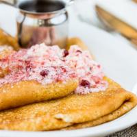 Swedish Pancakes · Thin House Made Crepes topped with lingonberries & whipped butter