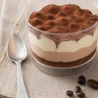 Tiramisu · Coffee and Zabaione cream on a layer of sponge cake soaked in espresso, dusted with cocoa po...
