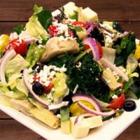 Greek Salad · Lettuce, tomatoes, onion, olives, cucumber, artichoke hearts, carrots, pepperoncini, and fet...