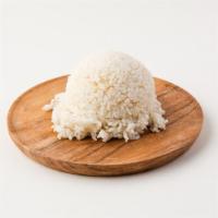 Steamed White Rice · Texas long grain steamed to perfection.
