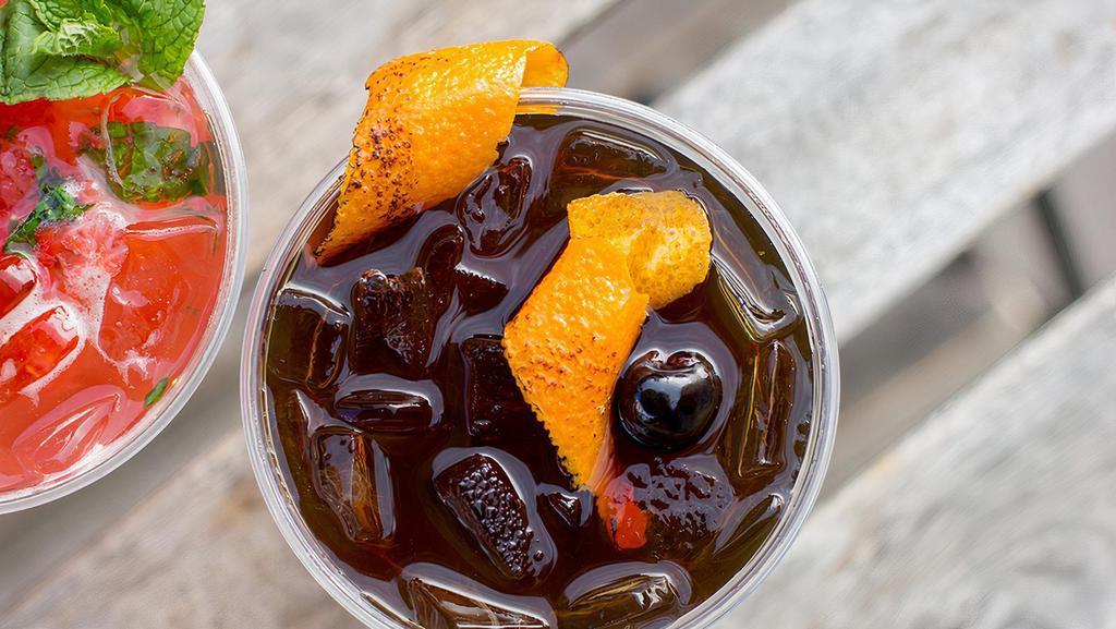 cold fashioned · cold-brew, orange bitters, gum syrup, flamed orange twist, luxardo cherry, served on the rocks.