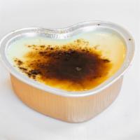 Creme Brulee · Creme Brulee is a dessert consisting of a rich custard base topped with a layer of hardened ...