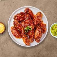 Korean Chicken Wings · Fresh chicken wings breaded, fried until golden brown, and tossed in soy sauce, brown sugar,...
