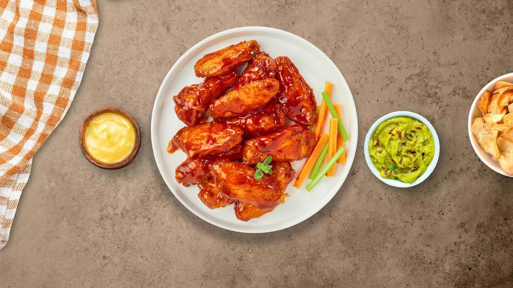 Buffalo Chicken Wings · Fresh chicken wings breaded, fried until golden brown, and tossed in buffalo sauce. Served with your choice of dipping sauce.