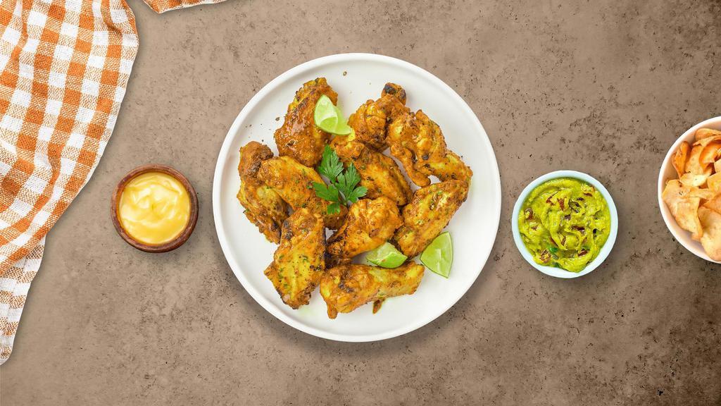 Lemon Pepper Wings · Fresh chicken wings breaded, fried until golden brown, and tossed in lemon pepper sauce. Served with your choice of dipping sauce.