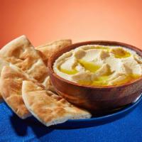 Hummus and Pita · Classic hummus with chickpeas, tahini, lemon juice, and olive oil. Served with pita.