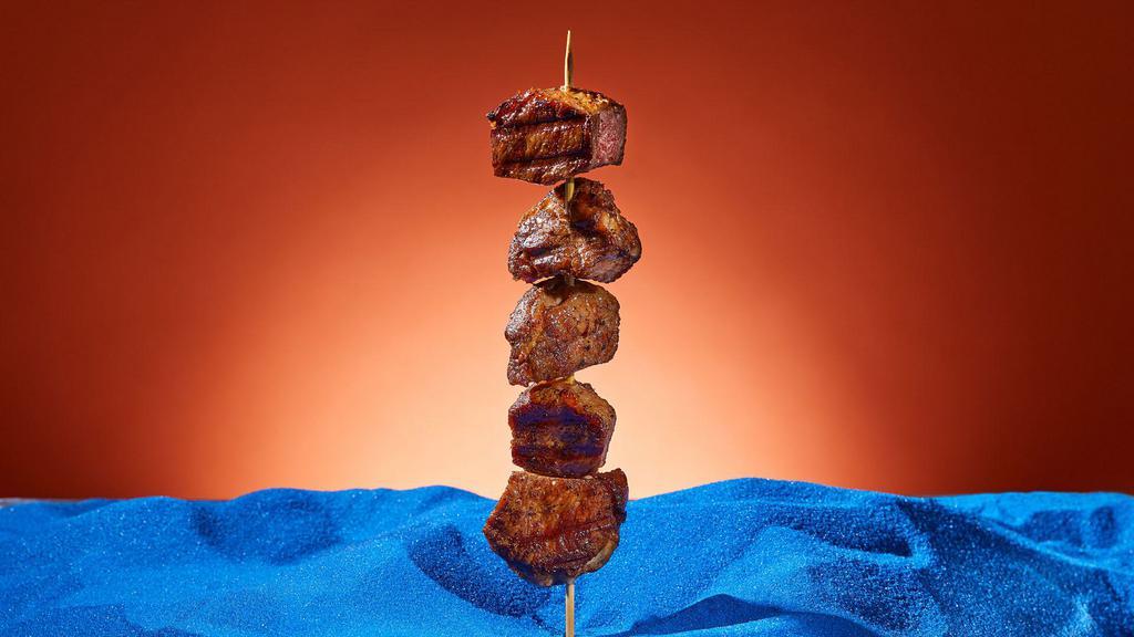Lamb Kebab (1Pc) · Marinated cubes of lamb grilled on a skewer.