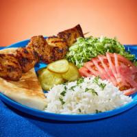 Grilled Chicken Shish Kebab Platter · Marinated cubes of chicken grilled on a skewer. Served with rice or hummus, lettuce, tomato,...