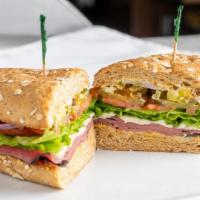 Pastrami · Lean pastrami with mayonnaise, mustard, lettuce, tomato, pickle, red onion & jalapeños.