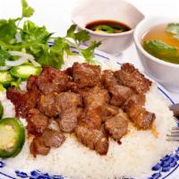43. Cơm Bò Lúc Lắc /  Shaken Beef Filet Mignon · Vietnamese shaken beef filet mignon served with steamed rice.