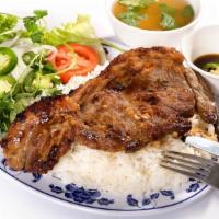 42. Cơm Thịt Bò Bít Tết /  New York Steak · Beef new york steak served with steamed rice.