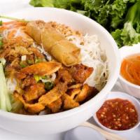 48. Bún Thịt Nướng, Chả Giò · BBQ Pork and Egg Roll with rice vermicelli w/ salad mix