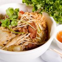 53. Bún Bò Xào · Stir Fry Lemongrass Beef, white onion, bean sprouts with rice vermicelli w/ salad mix