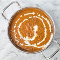 Dal Makhni · Black lentil cooked with ginger, garlic and a touch of cream.