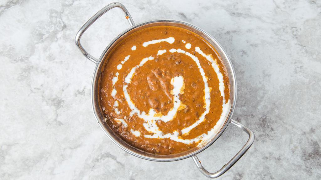 Dal Makhni · Kidney beans and black lentil cooked with Indian spices.